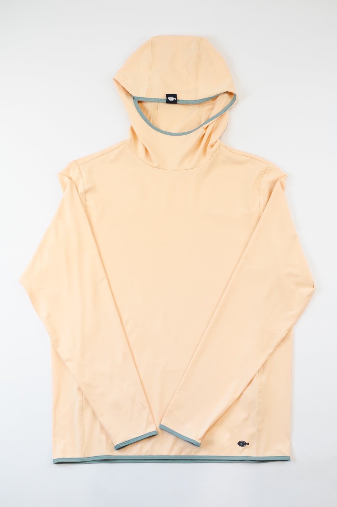 A peach-colored hoodie with a scuba neck design, laid flat on a plain background.